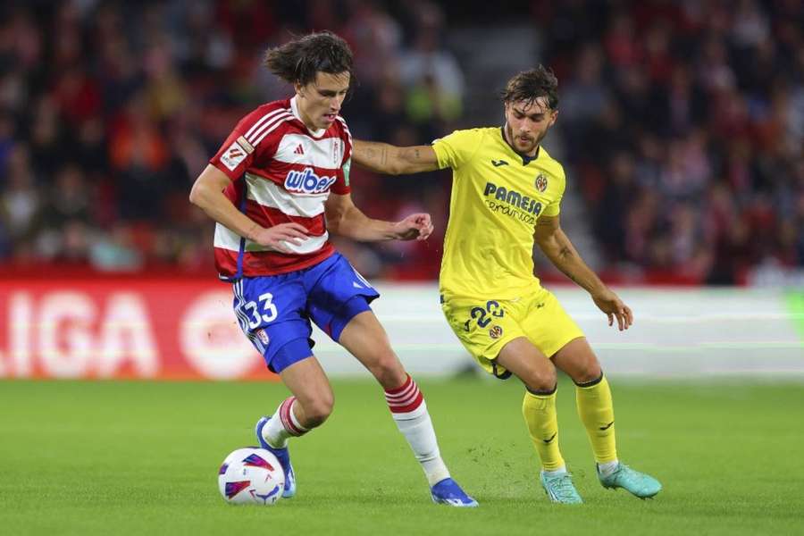 Ramon Terrats and Alvaro Fernandez battle for the ball