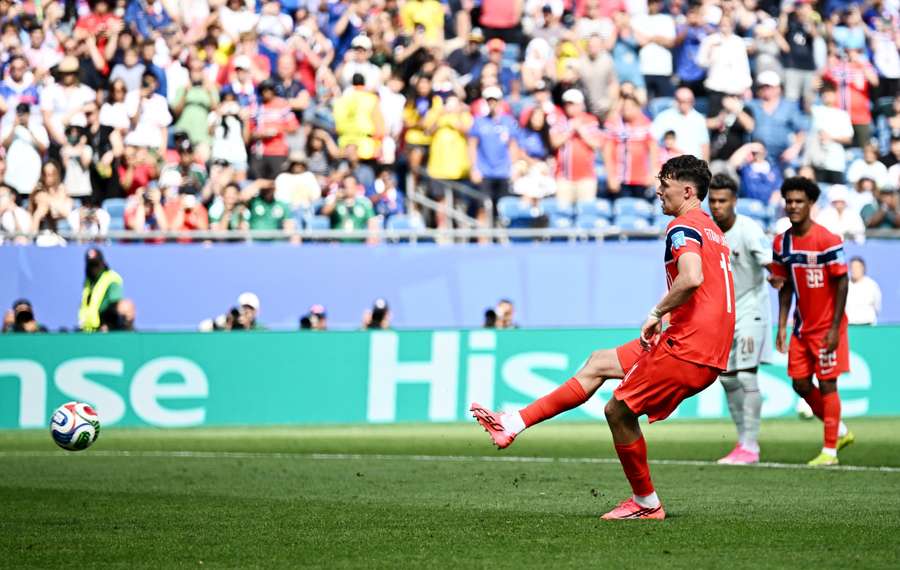 Norway's Jorgen Strand Larsen has his penalty saved by France's Mike Maignan