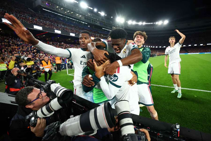 Real Madrid's Kylian Mbappe celebrates scoring their second goal with Eduardo Camavinga and teammates