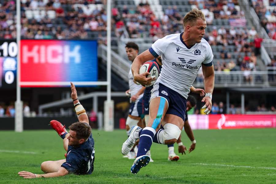 Van der Merwe (R) in action for Scotland