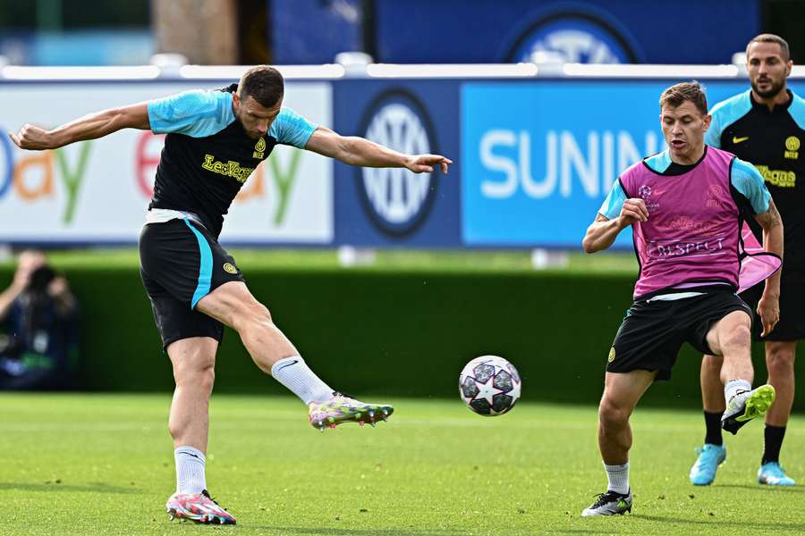 Inter's Edin Dzeko takes aim during training