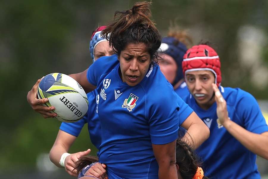 Italy's Sara Tounesi (L) has been banned for 12 matches after being found guilty of biting a Japan player 
