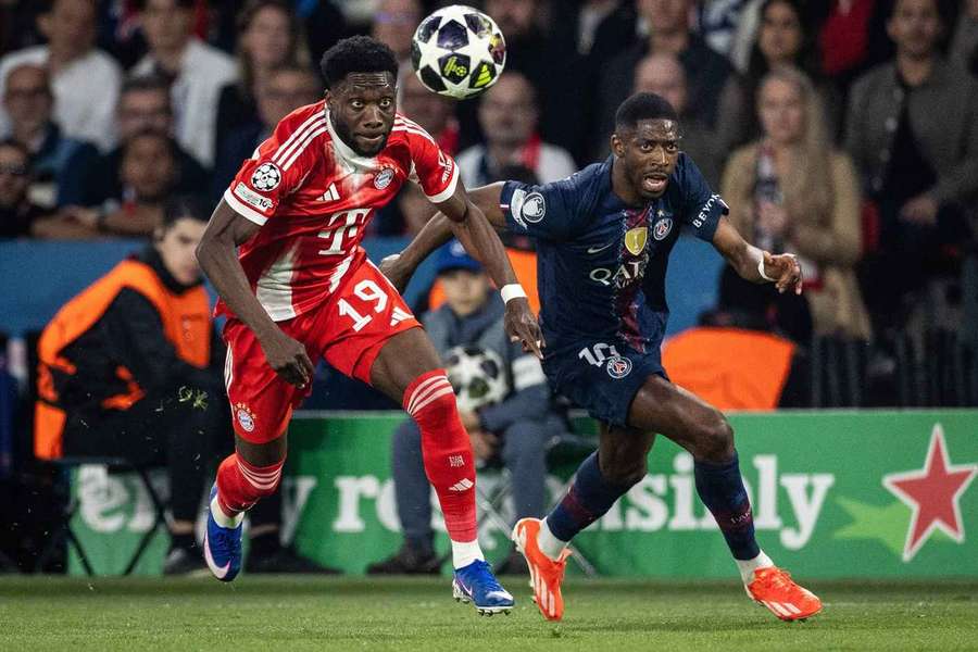PSG's Ousmane Dembele battles with Bayern Munich's Alphonso Davies