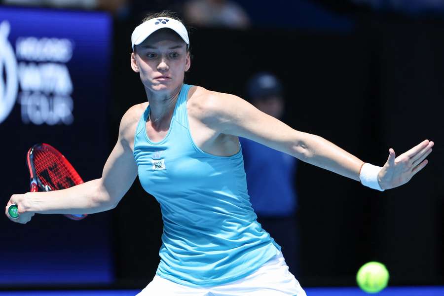 Kazakhstan’s Elena Rybakina hits a return against Germany’s Laura Siegemund during their women’s singles match at the United Cup