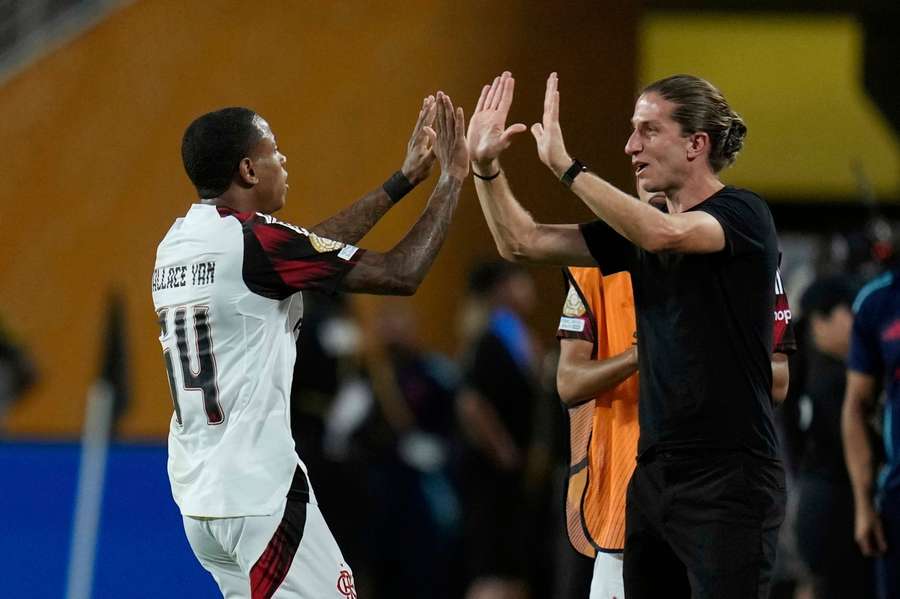 Wallace Yan celebrates his team's first goal with manager Filipe Luis during the Club World Cup match between Los Angeles FC and Flamengo