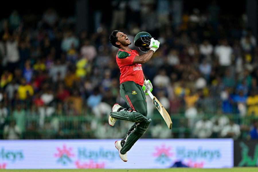 Bangladesh batter Tanzid Hasan celebrates Bangladesh's series-winning victory in Colombo.