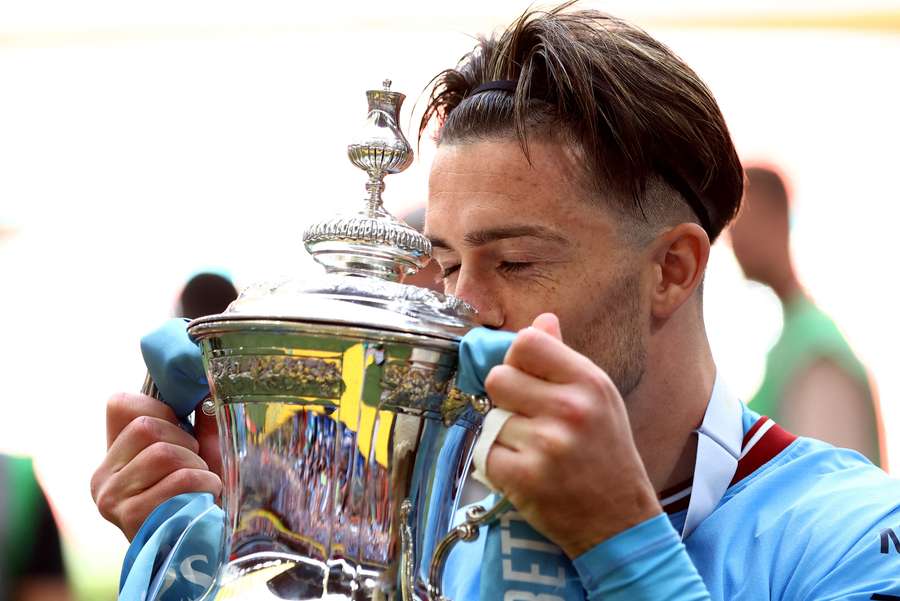 Jack Grealish kisses the FA Cup after Manchester City's victory
