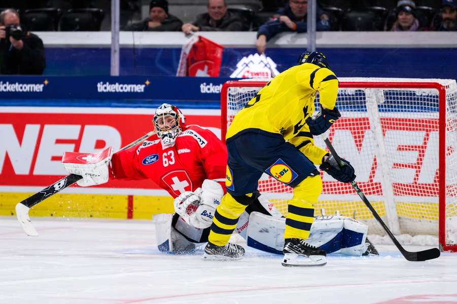 Rickard Hugg scores the opening penalty for Sweden Rickard Hugg scores the opening penalty for Sweden
