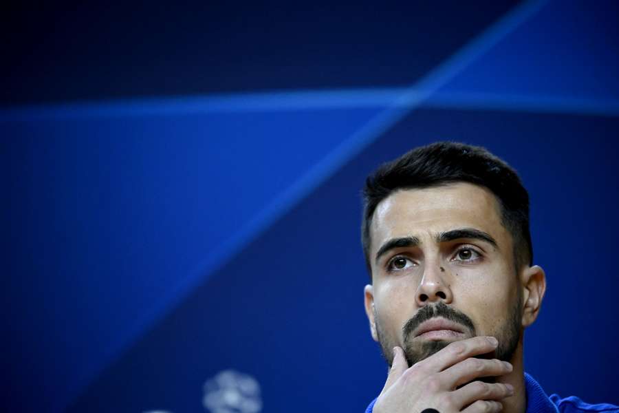 Porto goalkeeper Diogo Costa gestures during a press conference