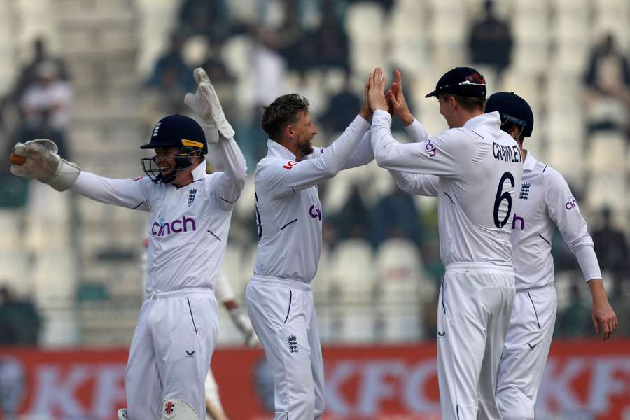 Root celebrates taking a wicket