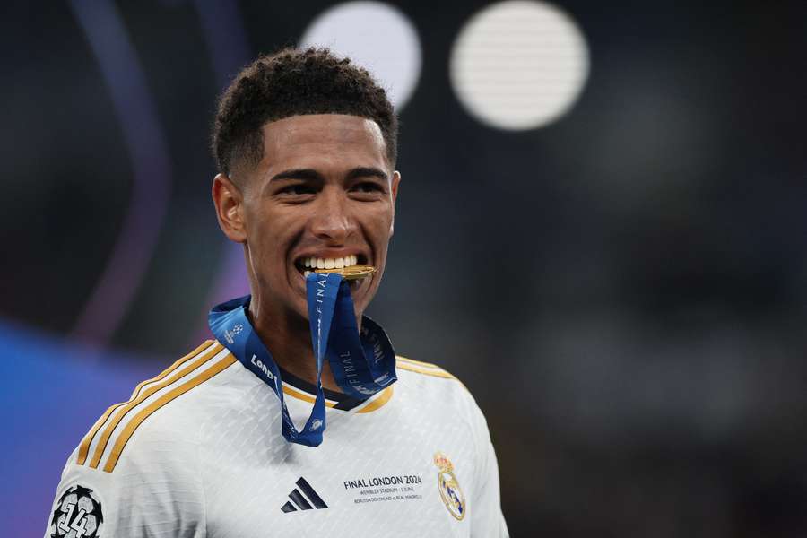 Real Madrid midfielder Jude Bellingham celebrates with his medal after winning the Champions League final