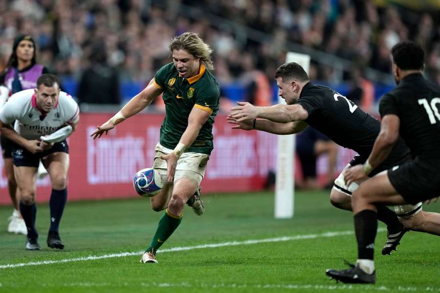 South Africa's Faf de Klerk kicks the ball during the Rugby World Cup final