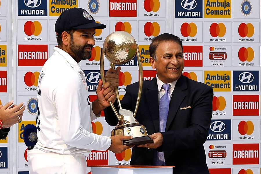 Sunil Gavaskar, right, presents Rohit Sharma with the Border-Gavaskar Trophy earlier in the year