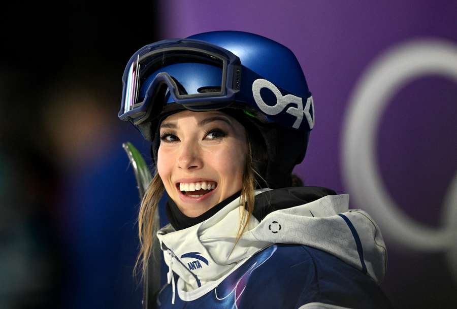 Eileen Gu of China reacts after her third run of big air qualification