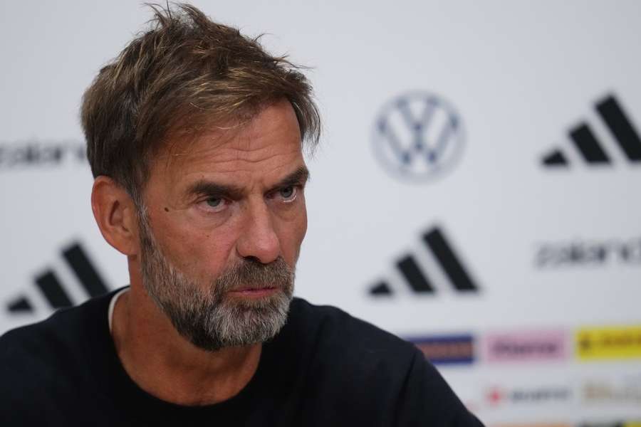 Jurgen Klopp speaks to the press