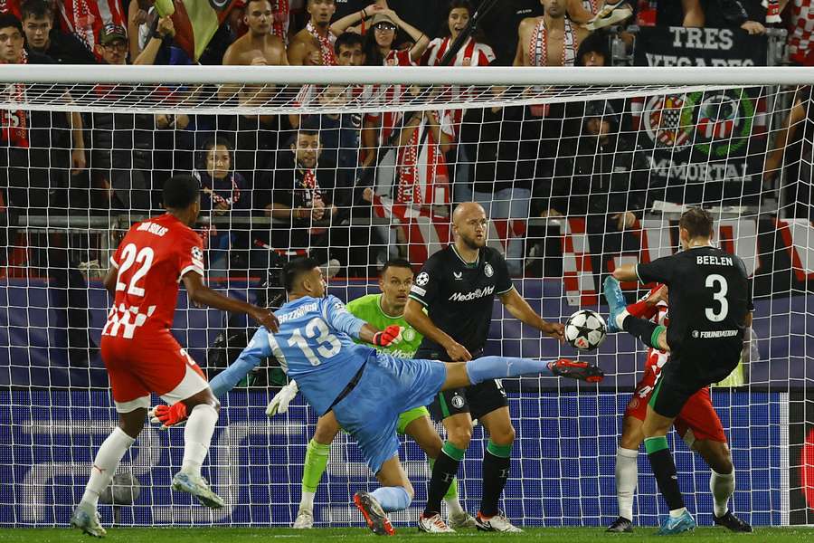 Girona's Paulo Gazzaniga shoots at goal