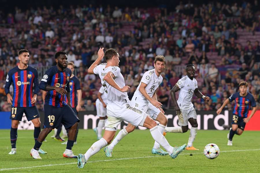 Bayern Munich's French defender Benjamin Pavard scores his side's third goal