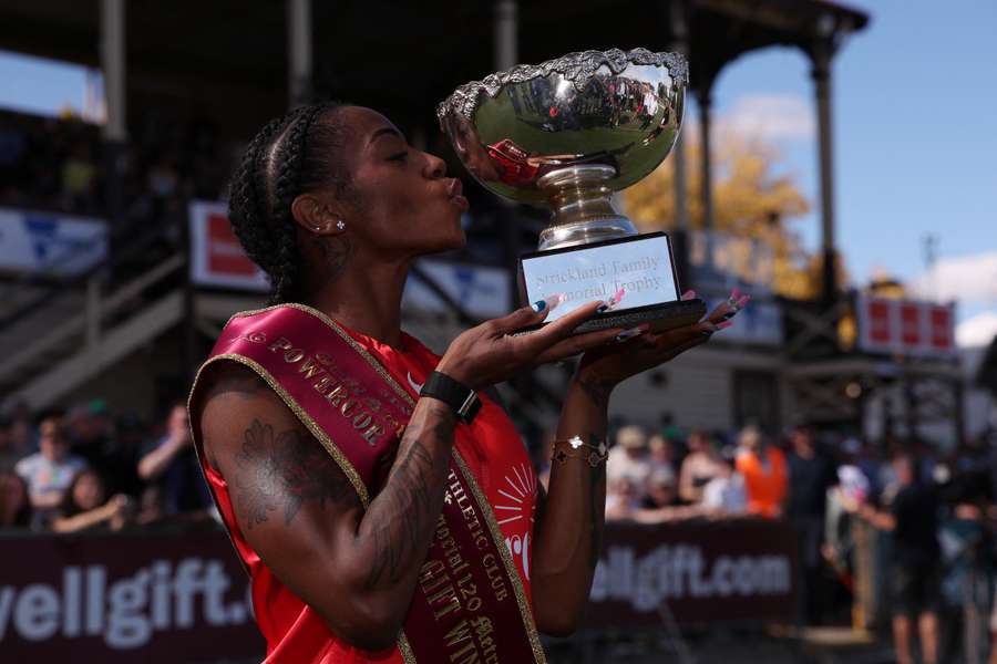 Sha'Carri Richardson embraces her Stawell Gift trophy on Monday.