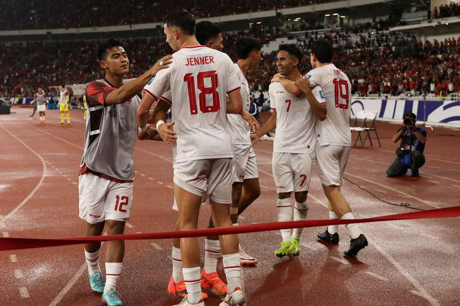 Indonesia's Marselino Ferdinan celebrates scoring their second goal against Saudi Arabia with teammates