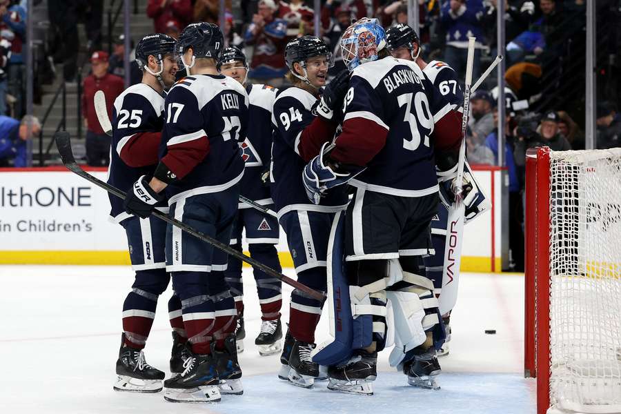 Colorado Avalanche players celebrating their win over the St. Louis Blues