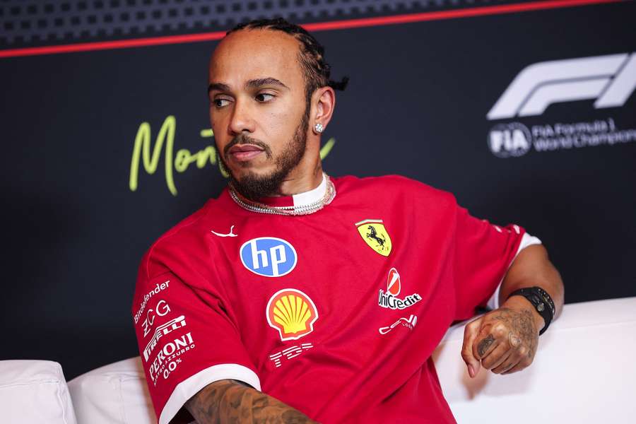 Lewis Hamilton speaks during a press conference