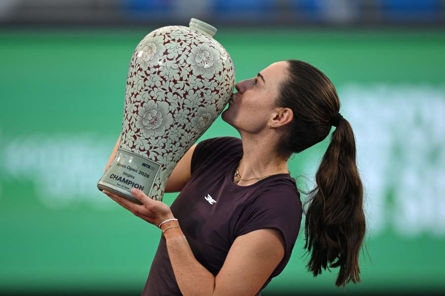 Kimberly Birrell poses with the trophy