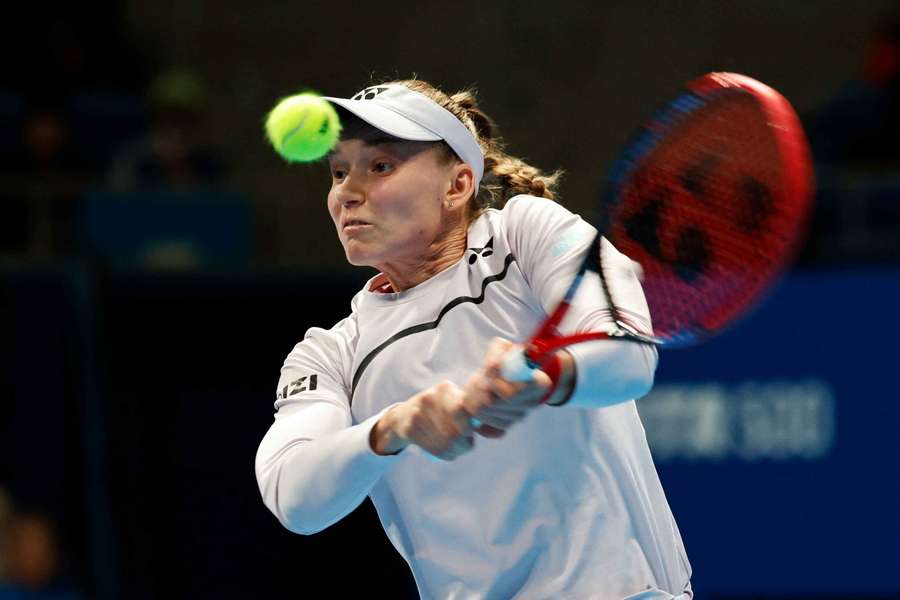 Elena Rybakina in action during her match against Yulia Putintseva in Tokyo
