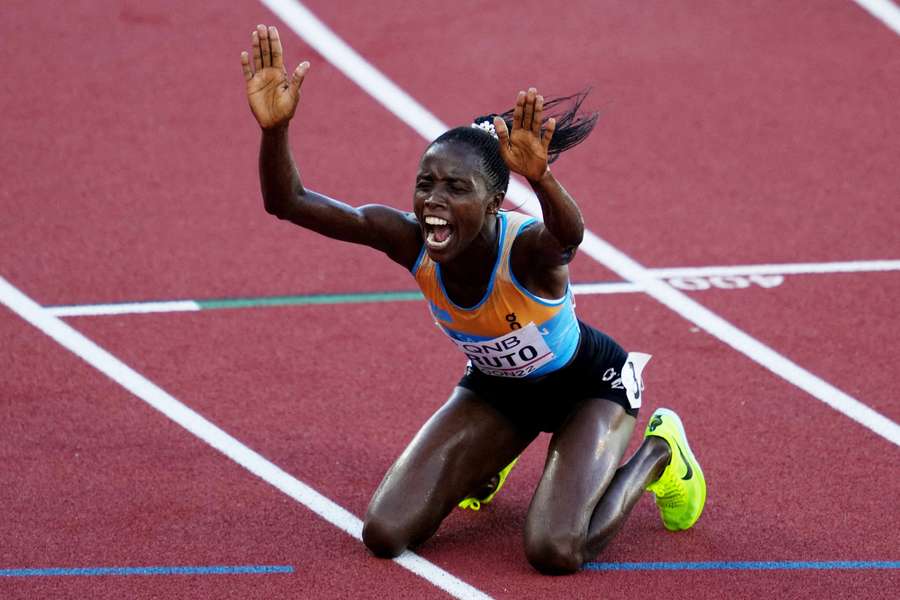 Kazakhstan's Norah Jeruto celebrates after winning the women's 3000 metres steeplechase final