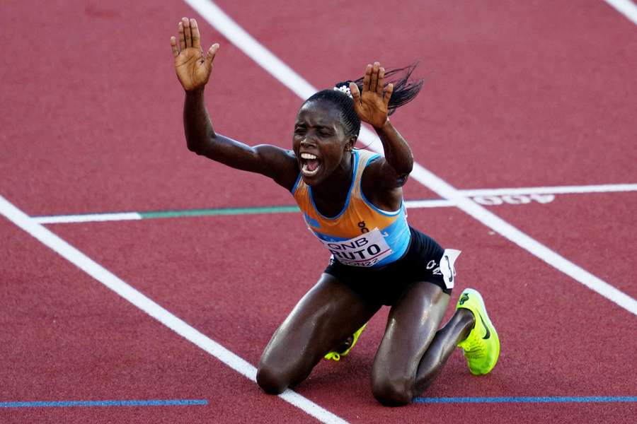 Kazakhstan's Norah Jeruto celebrates after winning the women's 3000 metres steeplechase final