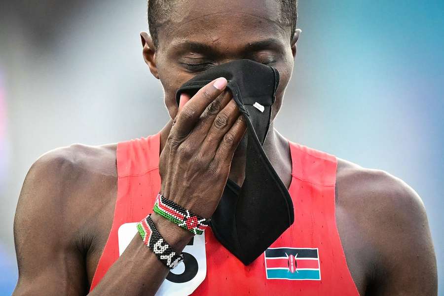 Stephen Ndangiri Kihu reacts after crossing the finish line in the men's 10,000m race walk final Stephen Ndangiri Kihu reacts after crossing the finish line in the men's 10,000m race walk final