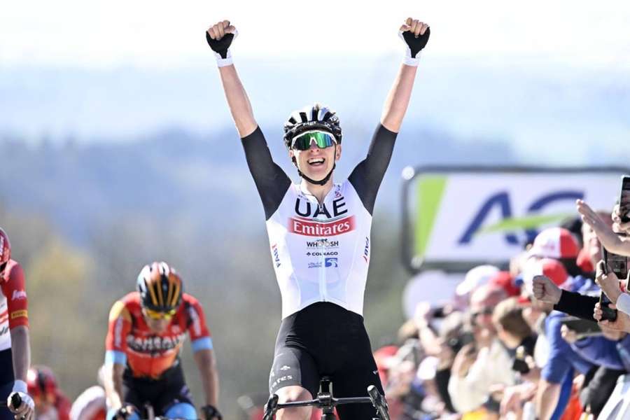 Pogacar Tadej raises his arms after winning the Fleche Wallonne