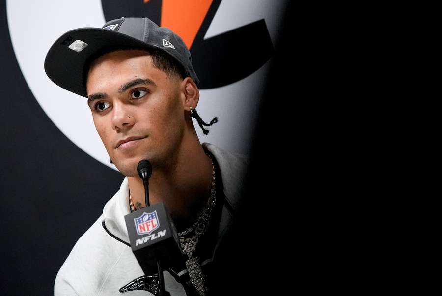 New England Patriots cornerback Christian Gonzalez speaks during the NFL Super Bowl Opening Night