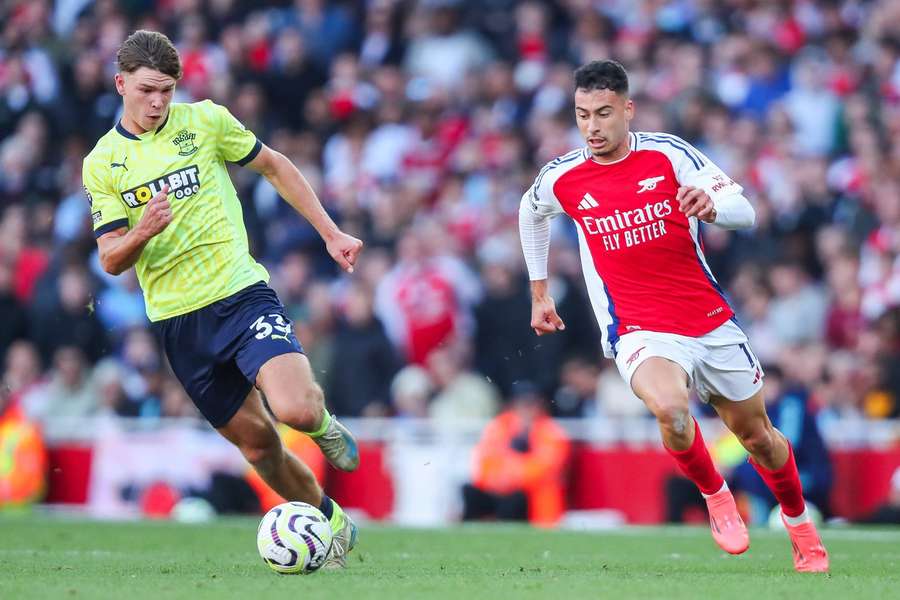 Arsenal's Gabriel Martinelli is put under pressure by Southampton's Tyler Dibling