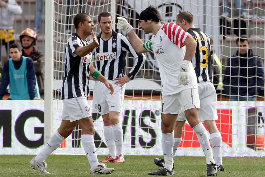 Buffon a Melo v drese Juventusu.