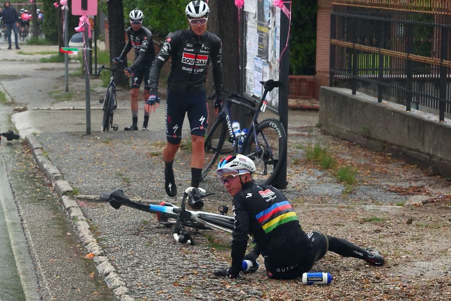 Quick Step rider Remco Evenepoel (foreground) is seen after crashing during the fifth stage