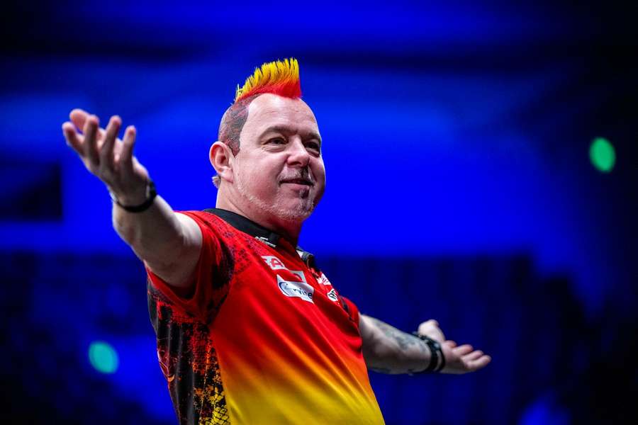 Peter Wright bude obhajovat loňský triumf.