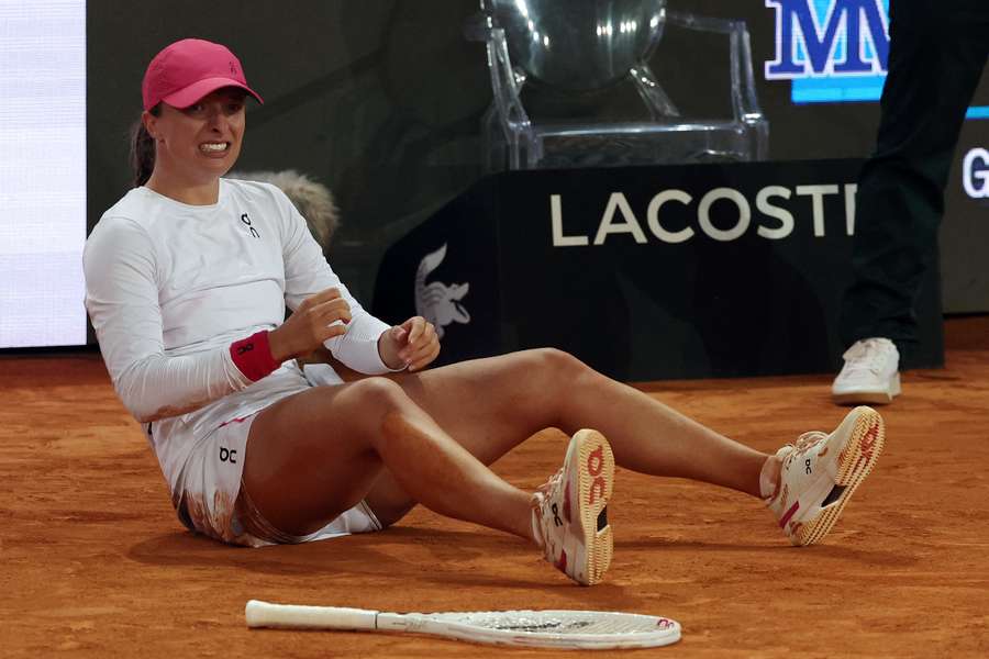 Iga Swiatek came through an "intense and crazy" Madrid Open final before lifting the trophy