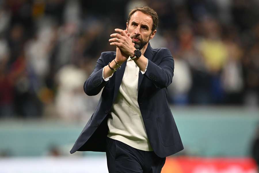 Gareth Southgate applauds supporters after exiting the World Cup against France