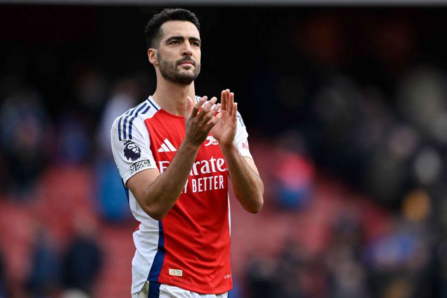 Arsenal's Mikel Merino celebrates after the match