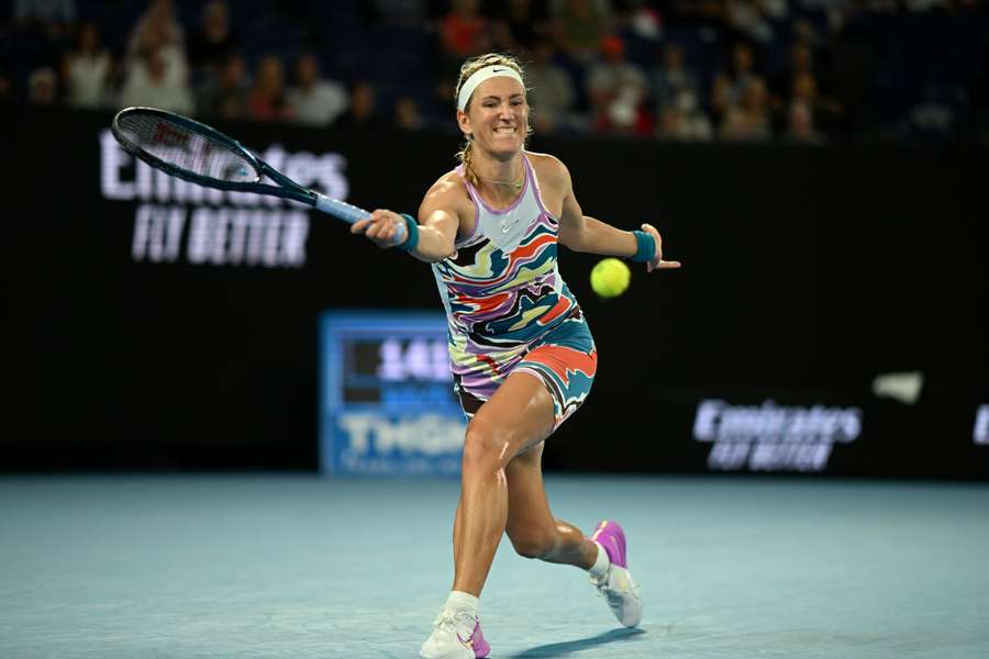 Victoria Azarenka hits a return against Jessica Pegula