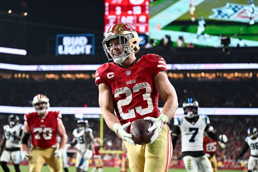 49ers RB Christian McCaffrey celebrates after a touchdown against Panthers in Week 12 49ers RB Christian McCaffrey celebrates after a touchdown against Panthers in Week 12
