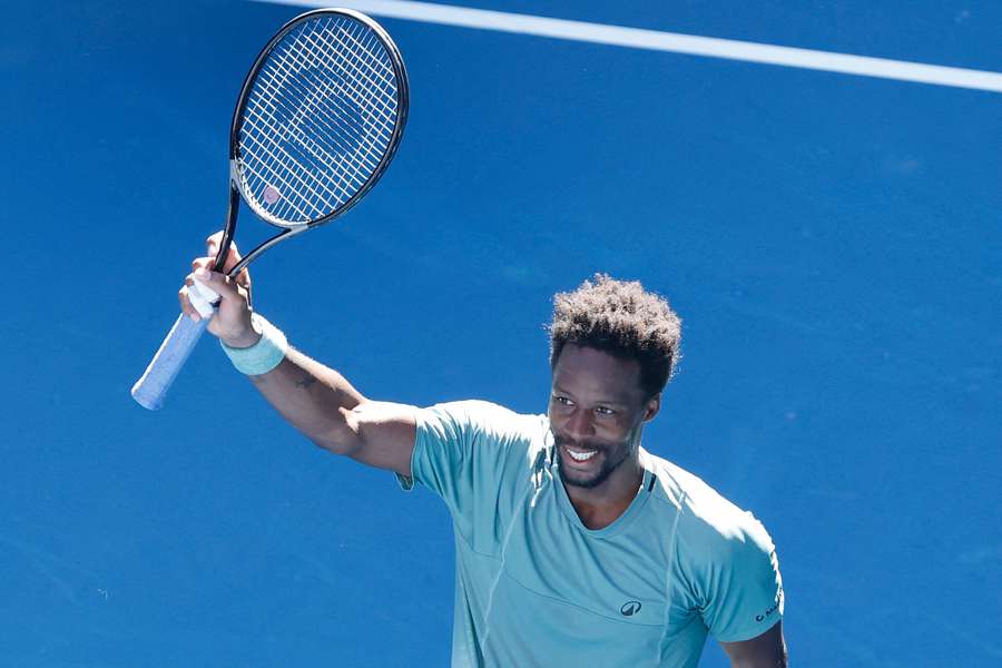 Gael Monfils celebrates beating Taylor Fritz