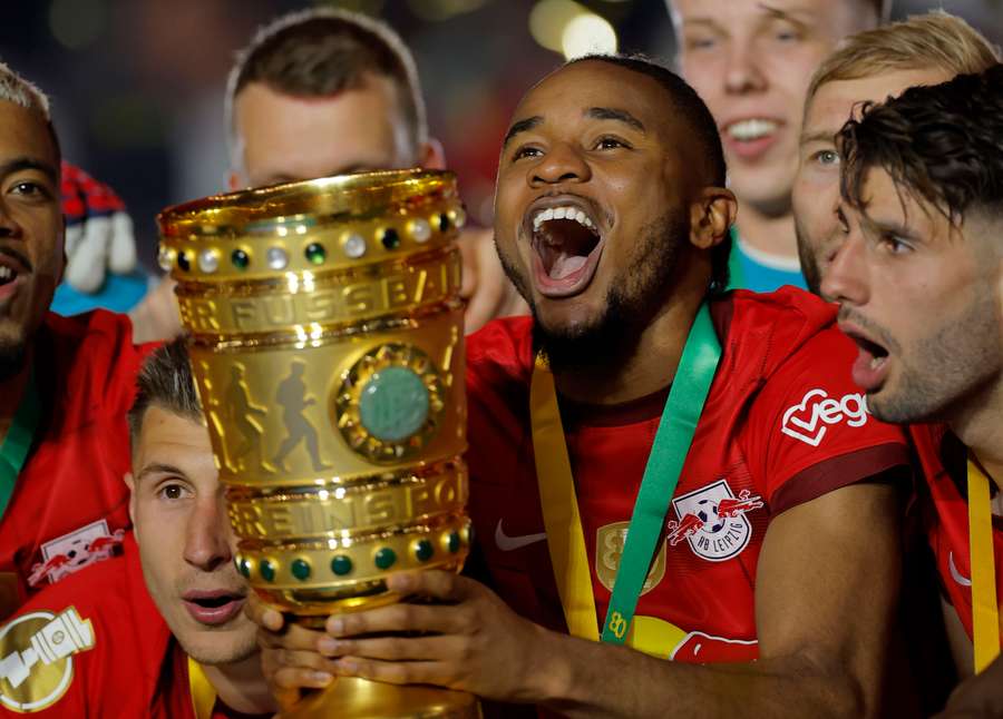 Christopher Nkunku with the DFB-Pokal trophy after victory with RB Leipzig