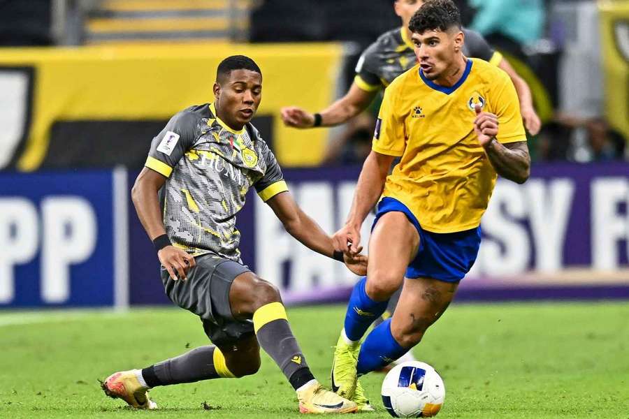 Florinel Coman într-o partidă cu Al-Gharafa