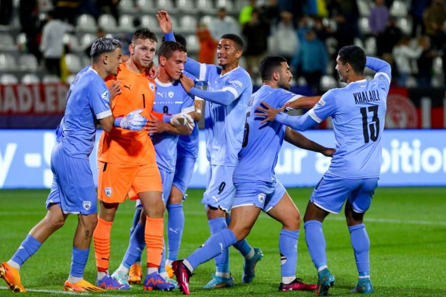 Israel's players celebrate their shootout victory