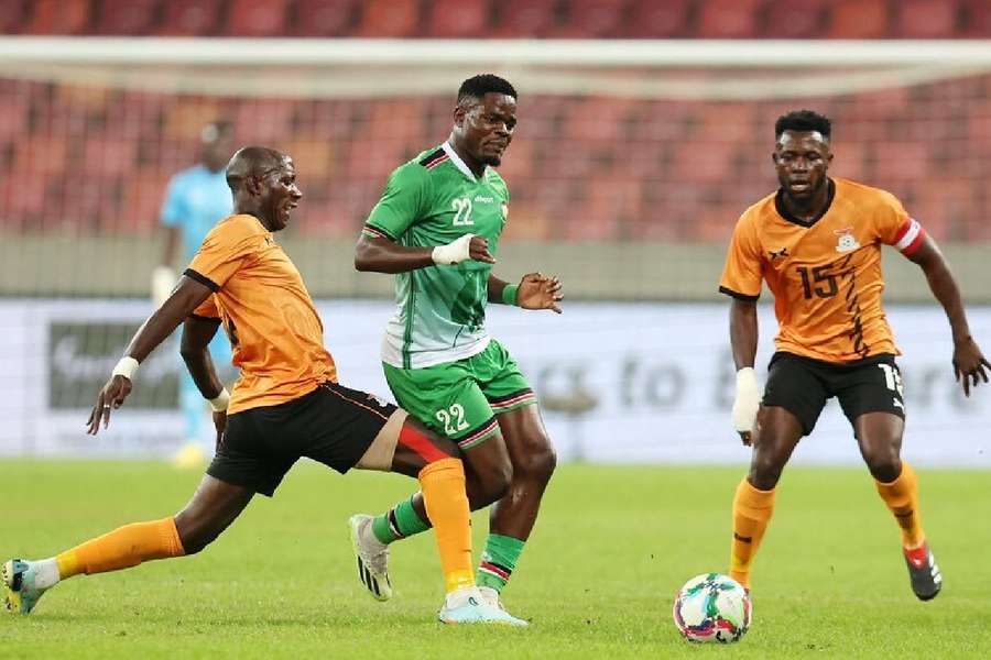 Kenya’s Benson Omalla (centre) in action against Zambia