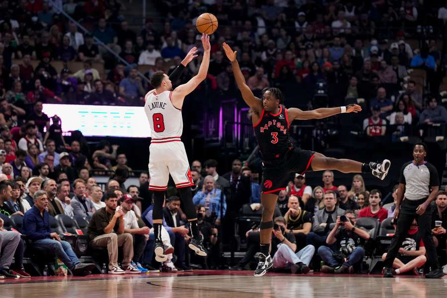 Zach LaVine of the Chicago Bulls shoots against O.G. Anunoby of the Toronto Raptors