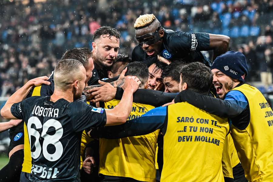 Napoli players celebrate their second goal against Sampdoria on Sunday.