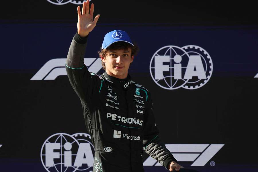 Mercedes' Kimi Antonelli celebrates after qualifying in pole position for the Chinese Grand Prix