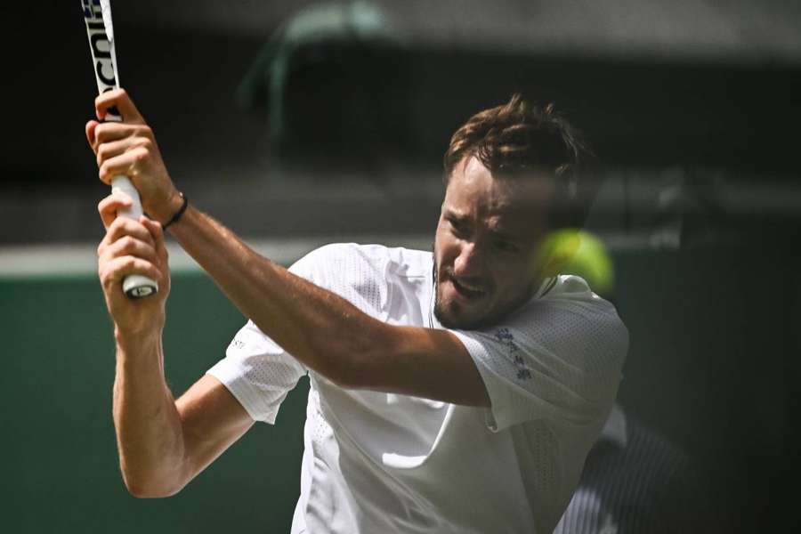 Daniil Medvedev returns the ball to Jiri Vesely during their match on Court One